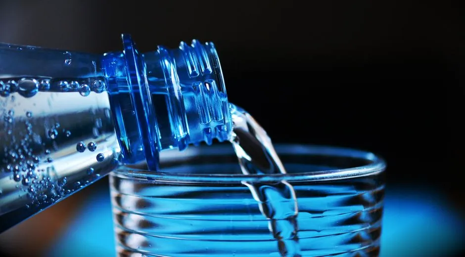 A glass being filled with water, the hardness of which varies widely across the UK