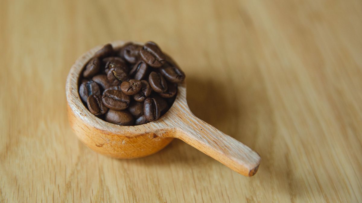 Roasted coffee beans, a running cost of a commercial coffee machine