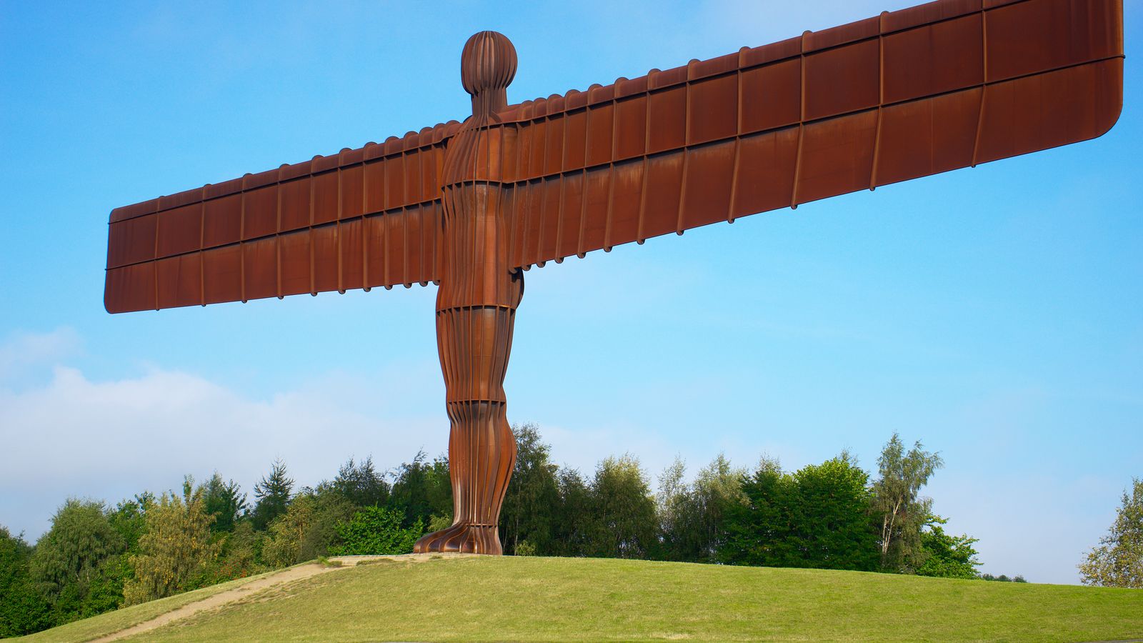 The Angel of the North sculpture in Gateshead against a blue sky